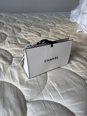 CHANEL White Tote-Style Gift Bag with Black Trim and Ribbon